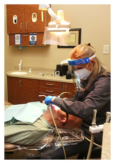 Flower Mound dentist treating dental patient