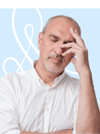 Man resting his head in his hand in frustration