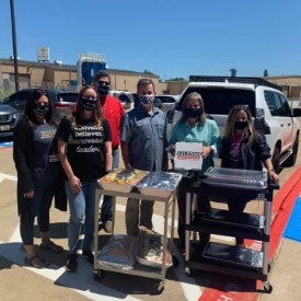 Group of dental team members at community event in Flower Mound