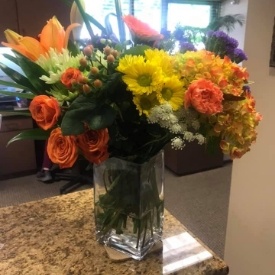 Flowers on dental office reception desk