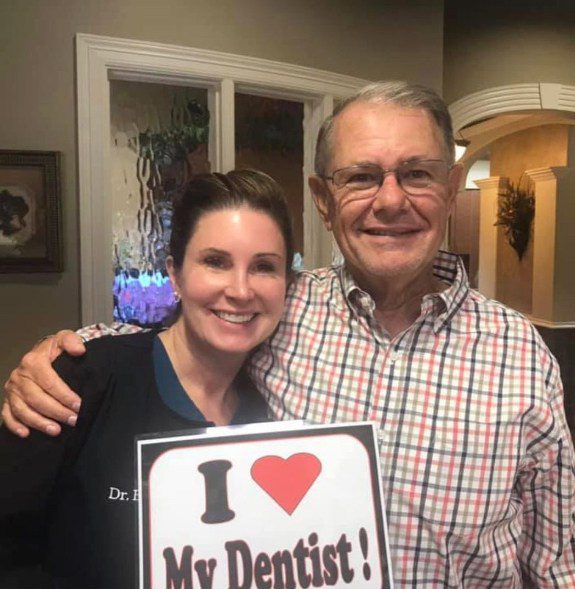 Doctor Barge and her dentist smiling together