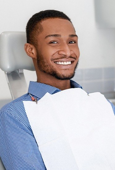 Man smiling during preventive dentistry visit