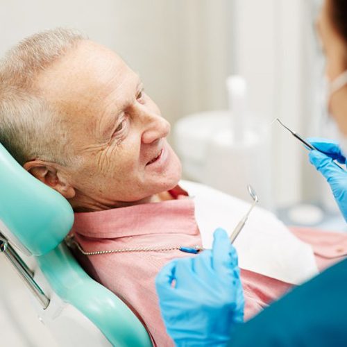 a patient undergoing an oral cancer screening