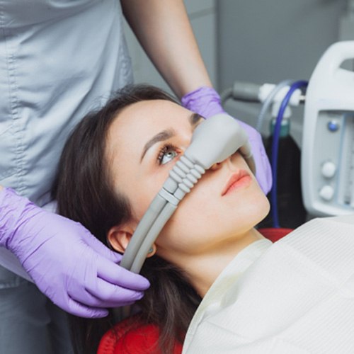 A woman getting sedation dentistry in Flower Mound