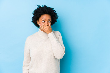 person with bad teeth covering their mouth